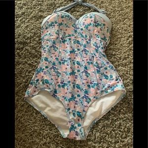 Compressive one piece swim suit